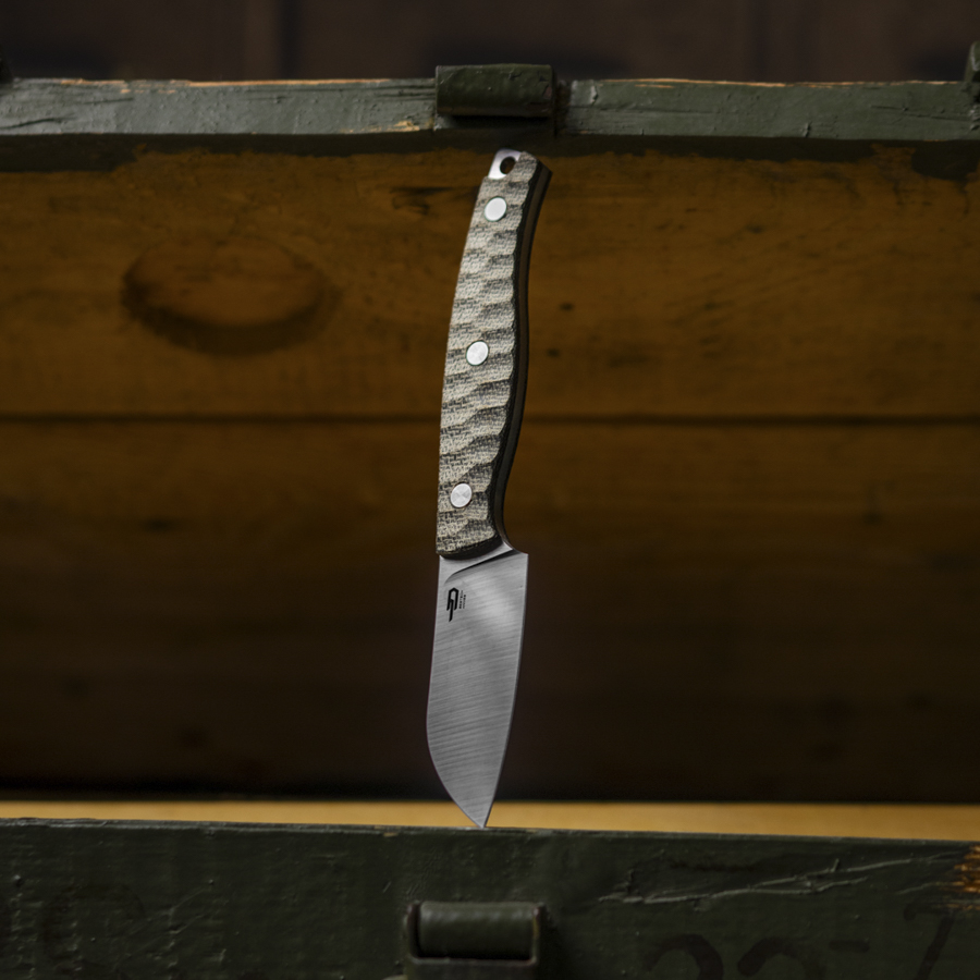 Sheepfoot blade of the Heidi #3 fixed blade knife made from 14C28N steel with subtle Knife Lounge logo